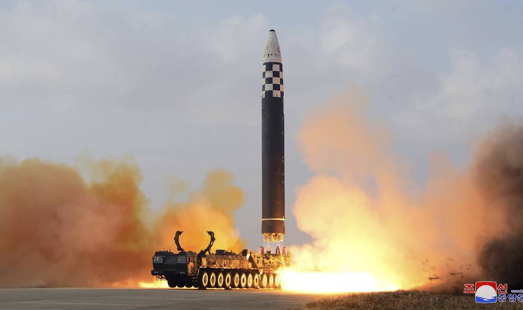 This photo provided on Nov. 19, 2022, by the North Korean government shows the test-firing of a missile at Pyongyang International Airport in Pyongyang, North Korea, Friday, Nov. 18, 2022.