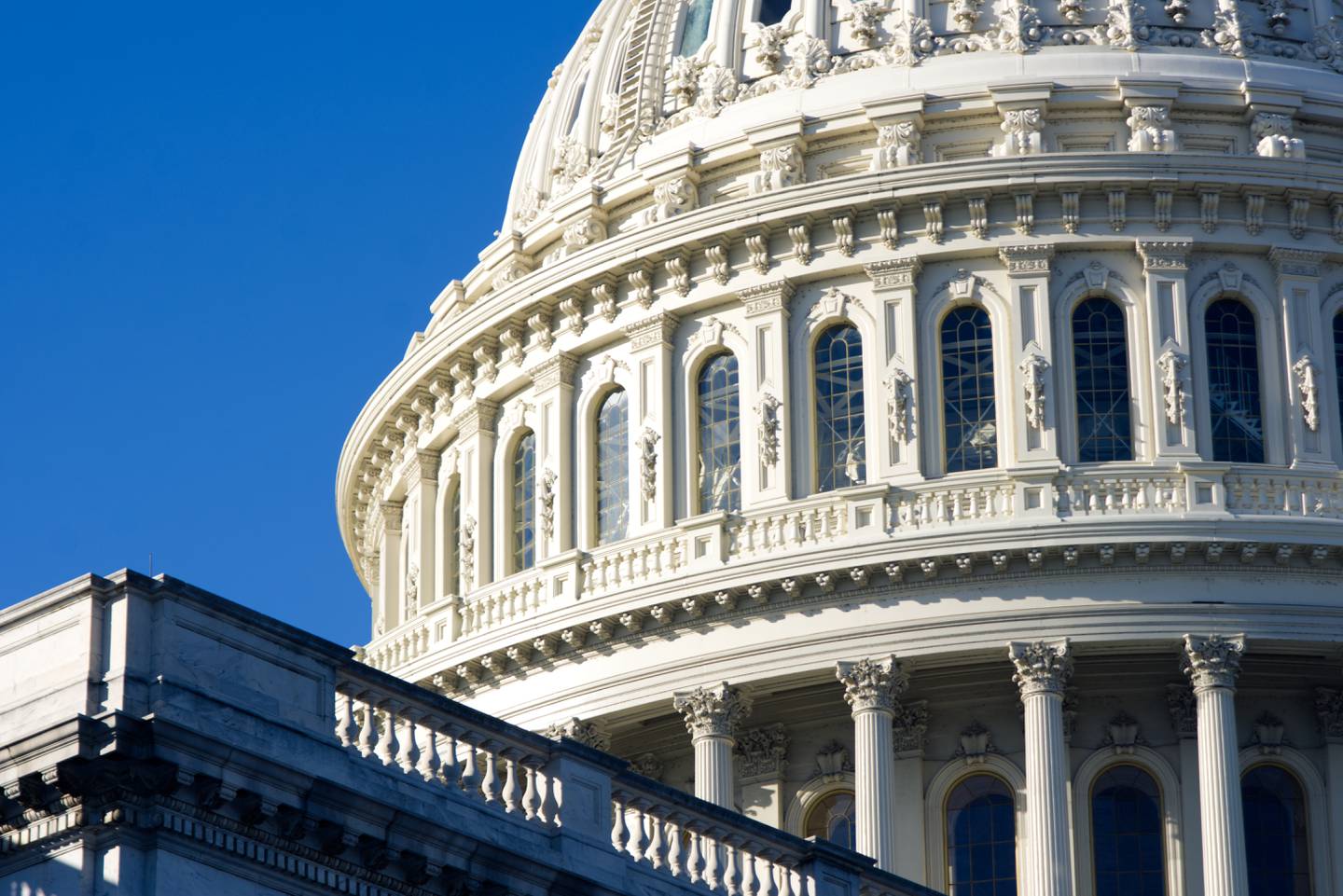 A portion of the Capitol Dome in Washington, D.C., is seen against clear blue skies on Dec. 4, 2022.