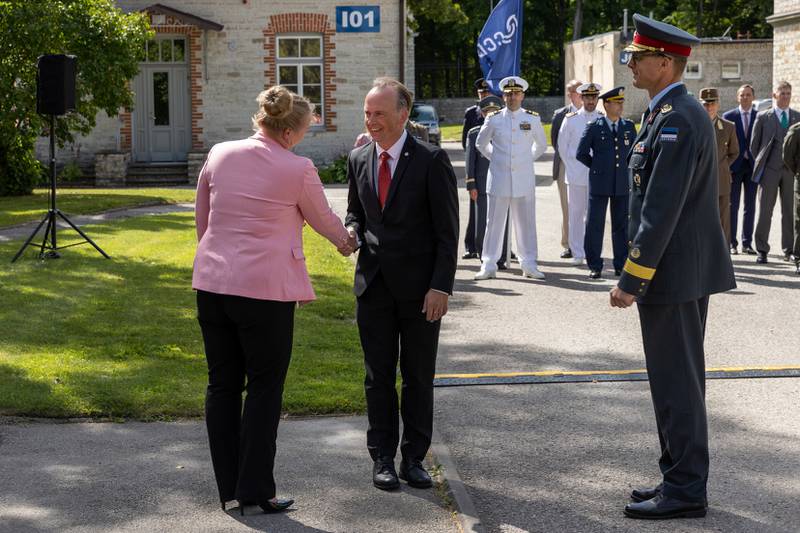 Mart Norma, center, took over as director of the director of the NATO Cooperative Cyber Defence Centre of Excellence in August 2022.